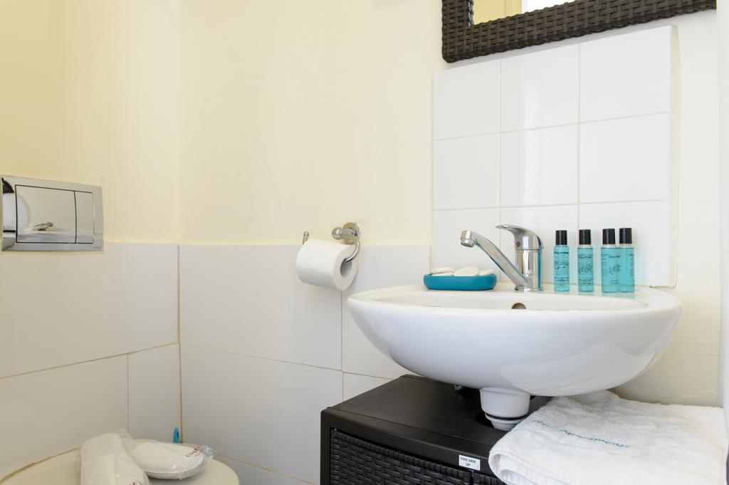 Star Apartments - Dizengoff Square Тель-Авив Номер фото