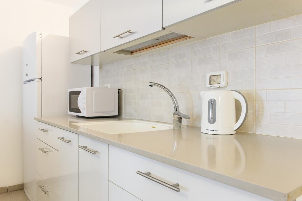 Star Apartments - Dizengoff Square Тель-Авив Номер фото